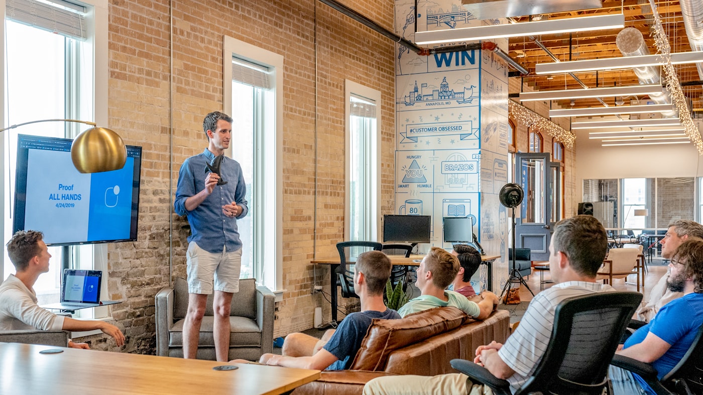 A small group sharing feedback during a live cohort at Earn AI Clash